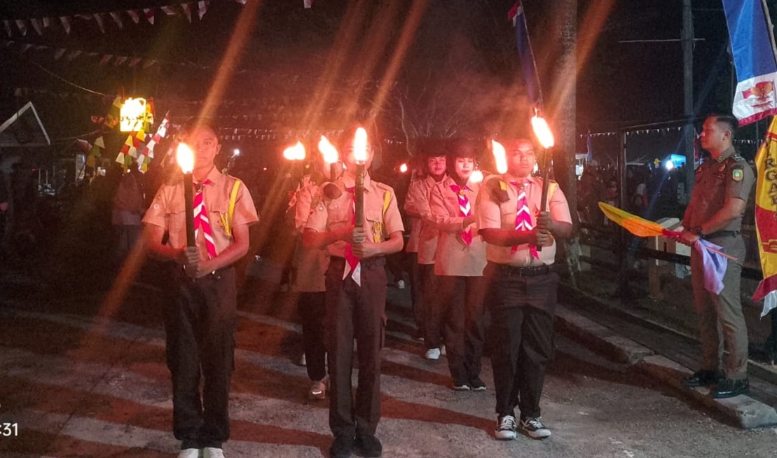 Semarak HUT ke-81 RI, Kecamatan Merbau Gelar Pawai Obor