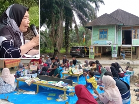 Anie Din Asah Literasi  di Tepian Sungai Kampar